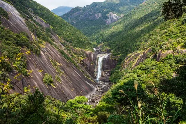 A view of Senpiro Waterfall from the observatory, a waterfall flowing from a single giant rock.