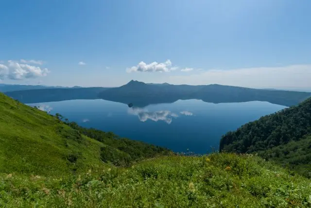 A mysterious lake with crystal-clear blue waters