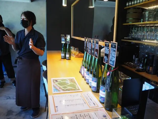 Tasting at the cafe space. Mr. Hiroyasu Honma, owner.