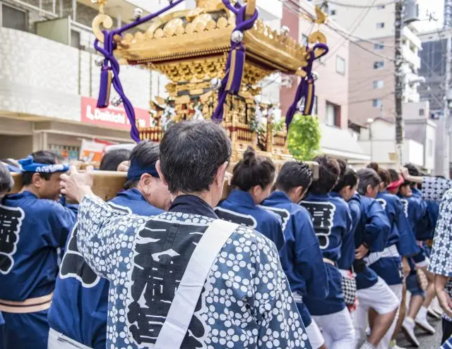 The iconic summer vibes as Mikoshi shrines parade across town.