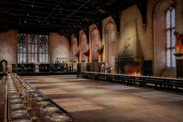 The Great Hall is flanked with animal-shaped candle holders, symbolizing the four houses.