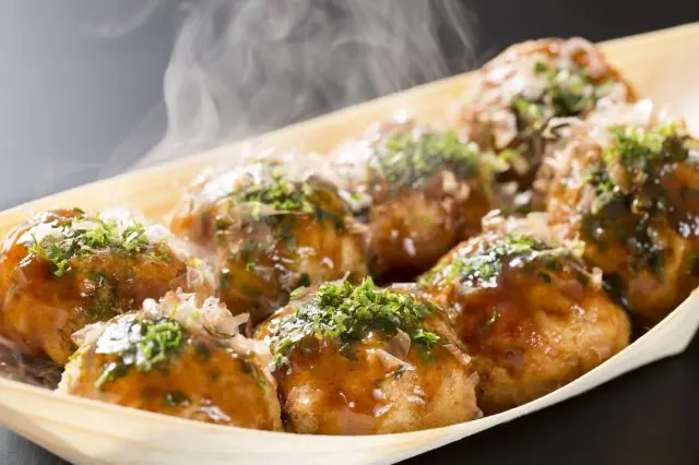 Takoyaki with a crispy outside and ooey-gooey center.
