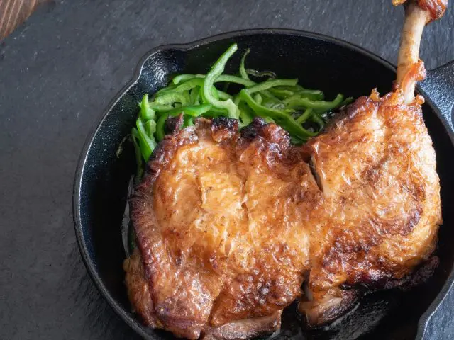 Bone-in chicken, crispy skin on the outside and juicy meat inside.