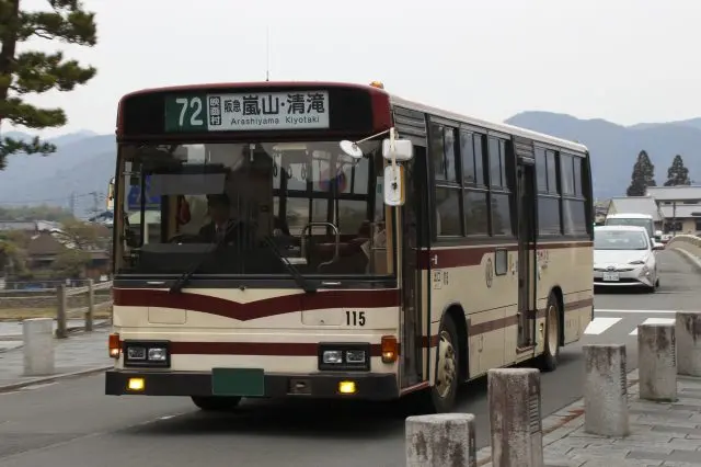 Remember the Kyoto Bus by its cream color with red lines.