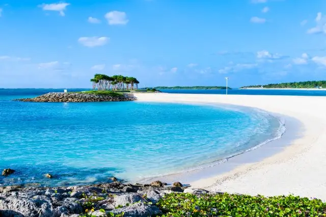 Relaxing and enjoying a swim at a beautiful beach is highly recommended. 