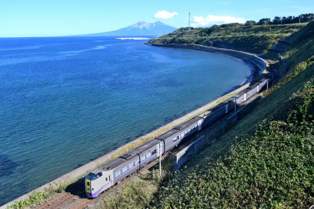 Enjoy the breathtaking nature of Hokkaido from the train window.