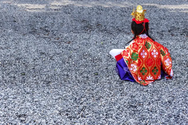 A child dressed in traditional chigo attire