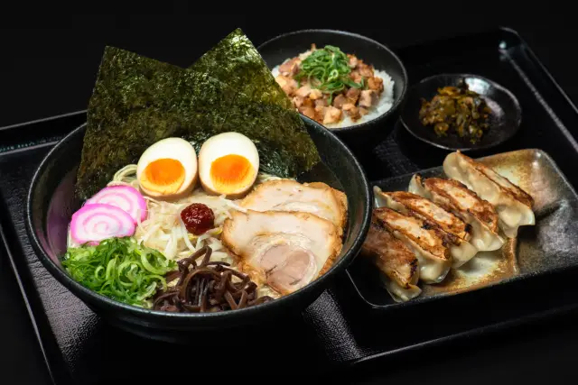 The Samurai Yufu Set, a popular No.1 choice, complete with ramen, gyoza, and a char siu rice bowl.