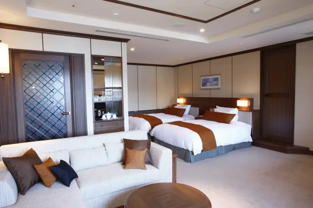 A premium twin room and ensuite bath with a view.