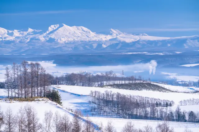 The serene, snow-covered landscape of winter in Kamifurano