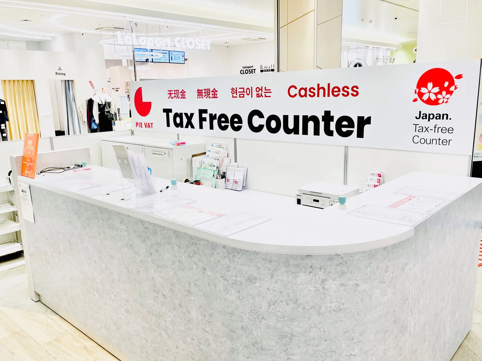 Tax-Free Counter with a white color scheme; look for the “Tax-Free Counter” sign.