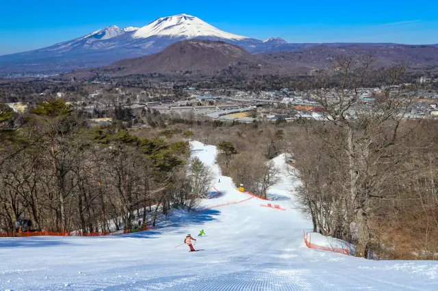 Ski with panoramic views of Mt. Asama in front of you.