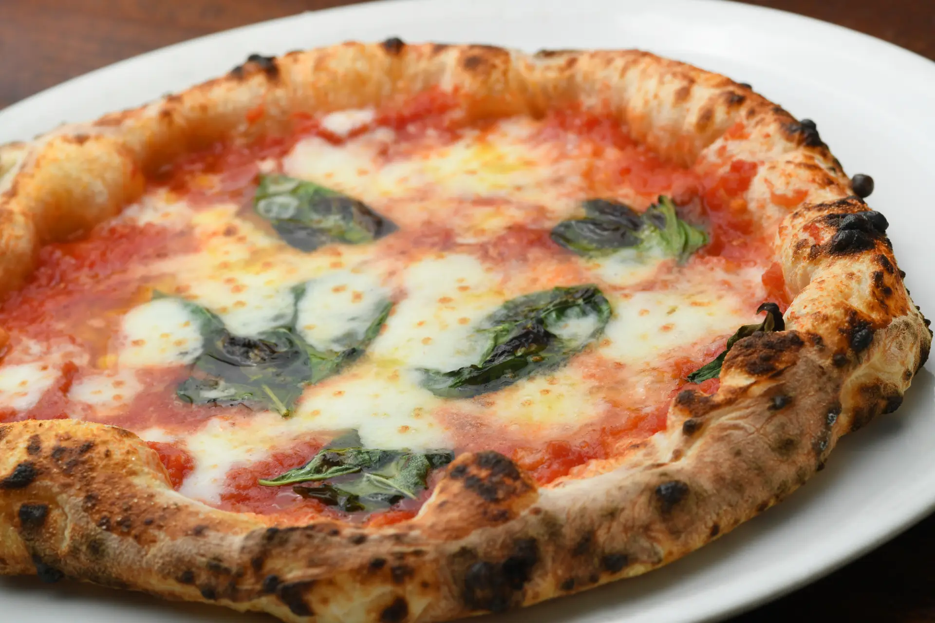 石窯で焼き上げる手作りピザが看板メニュー(※写真はイメージです。)