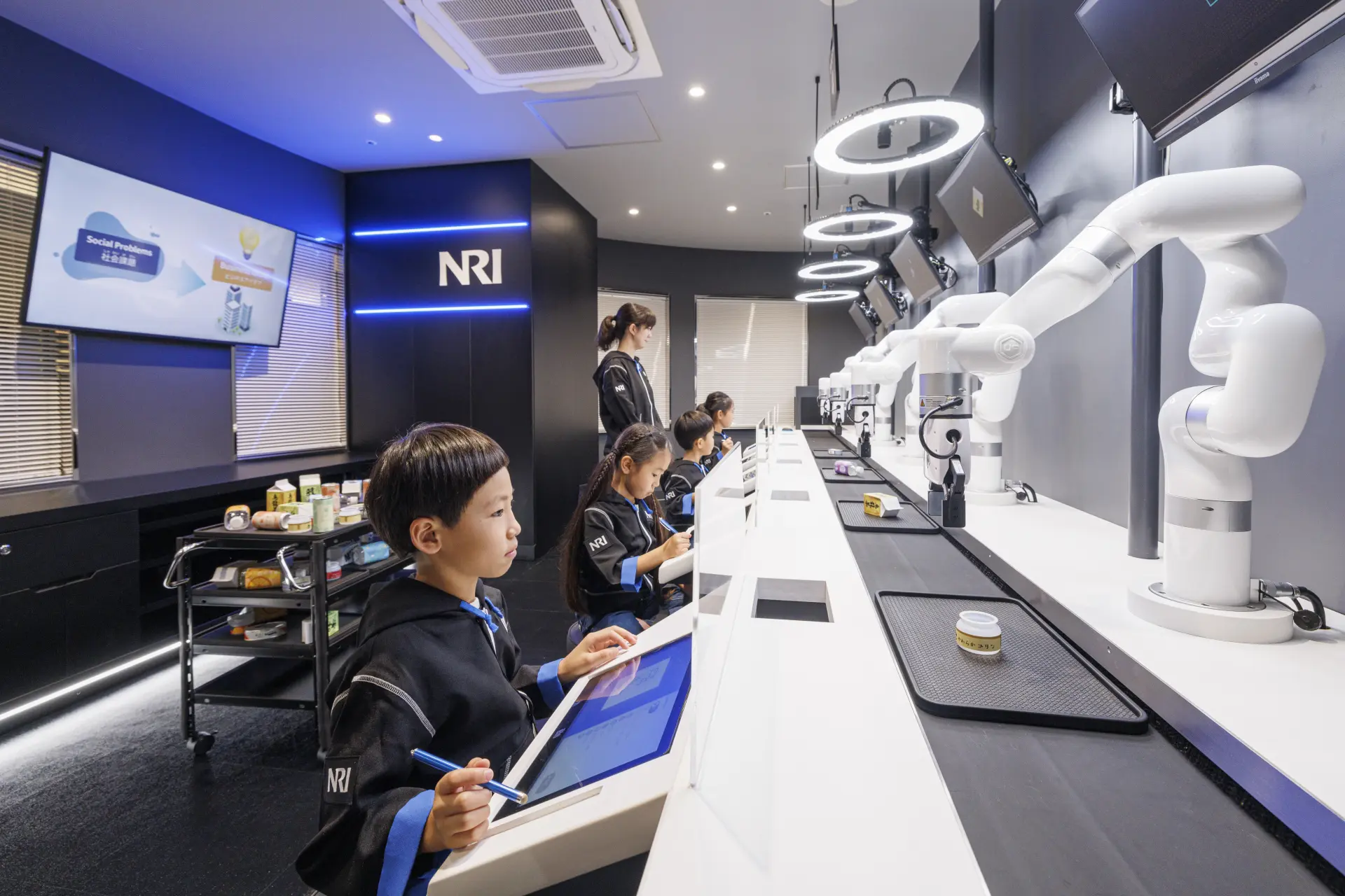 DX engineers developing a robot system