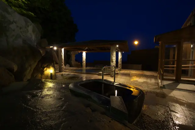 A rock bath carved out of natural stone