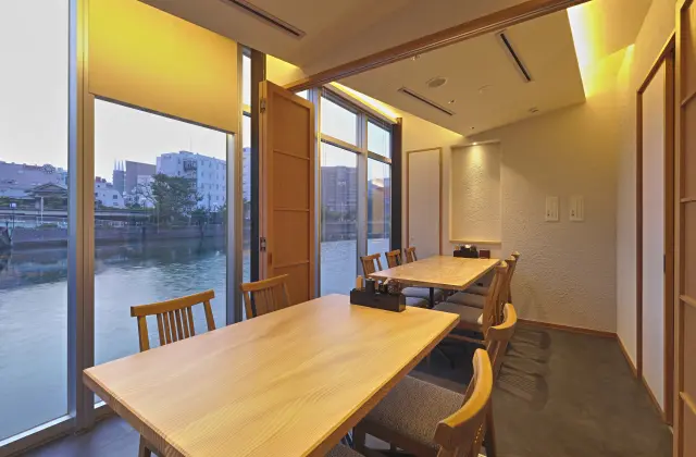Riverside private rooms offer both table seating and sofa seating for a complete sense of privacy.