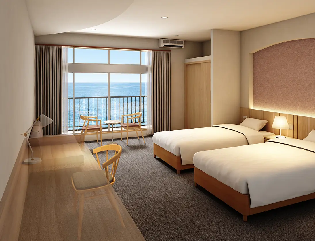 バルコニーから二ツ亀と日本海を望む客室