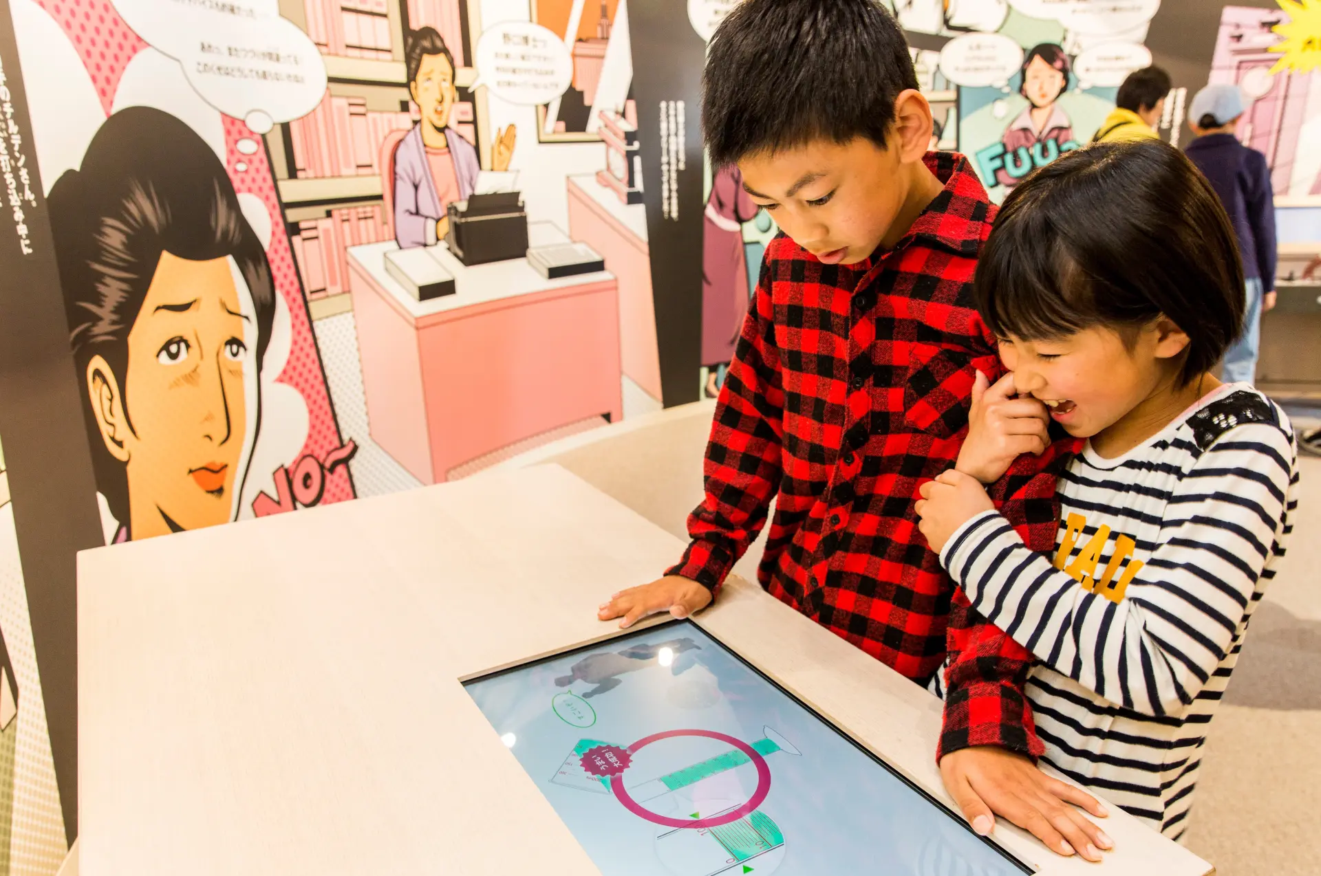 ゲームを通じて野口博士の功績を学ぶことができるコーナーもある