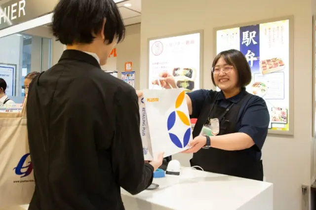 PLUSTA staff welcoming guests with smiles
