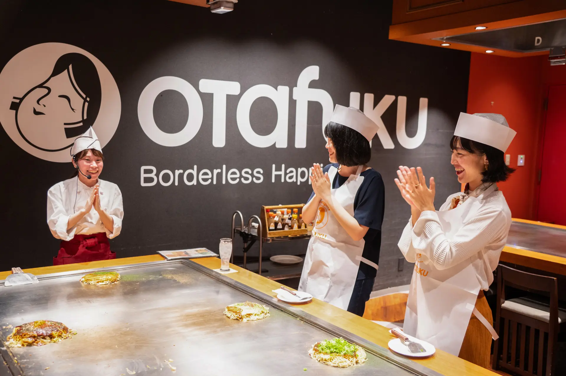 Professional okonomiyaki chefs are there to guide you every step of the way.