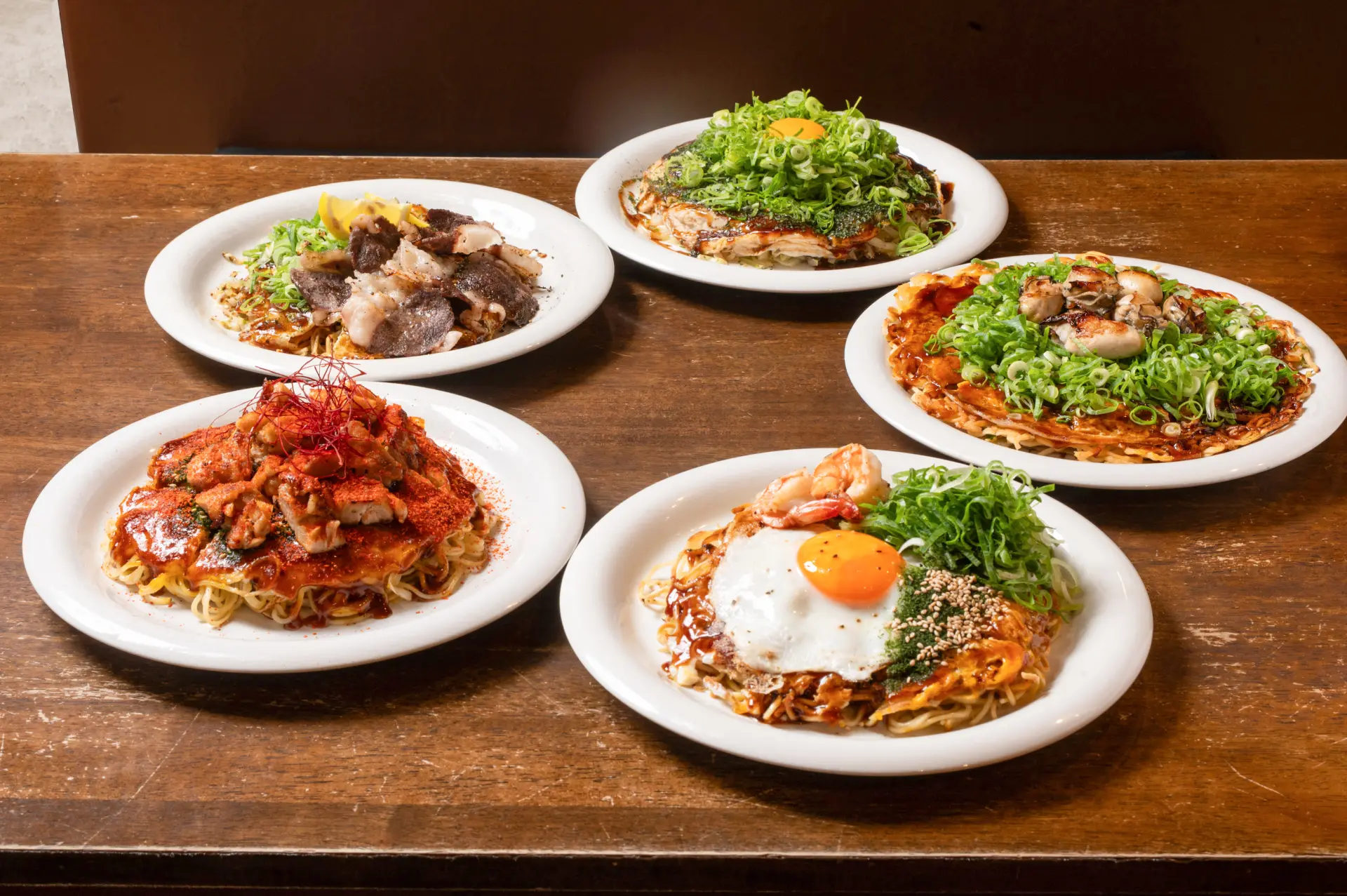 A selection of outstanding Hiroshima-style okonomiyaki from renowned restaurants