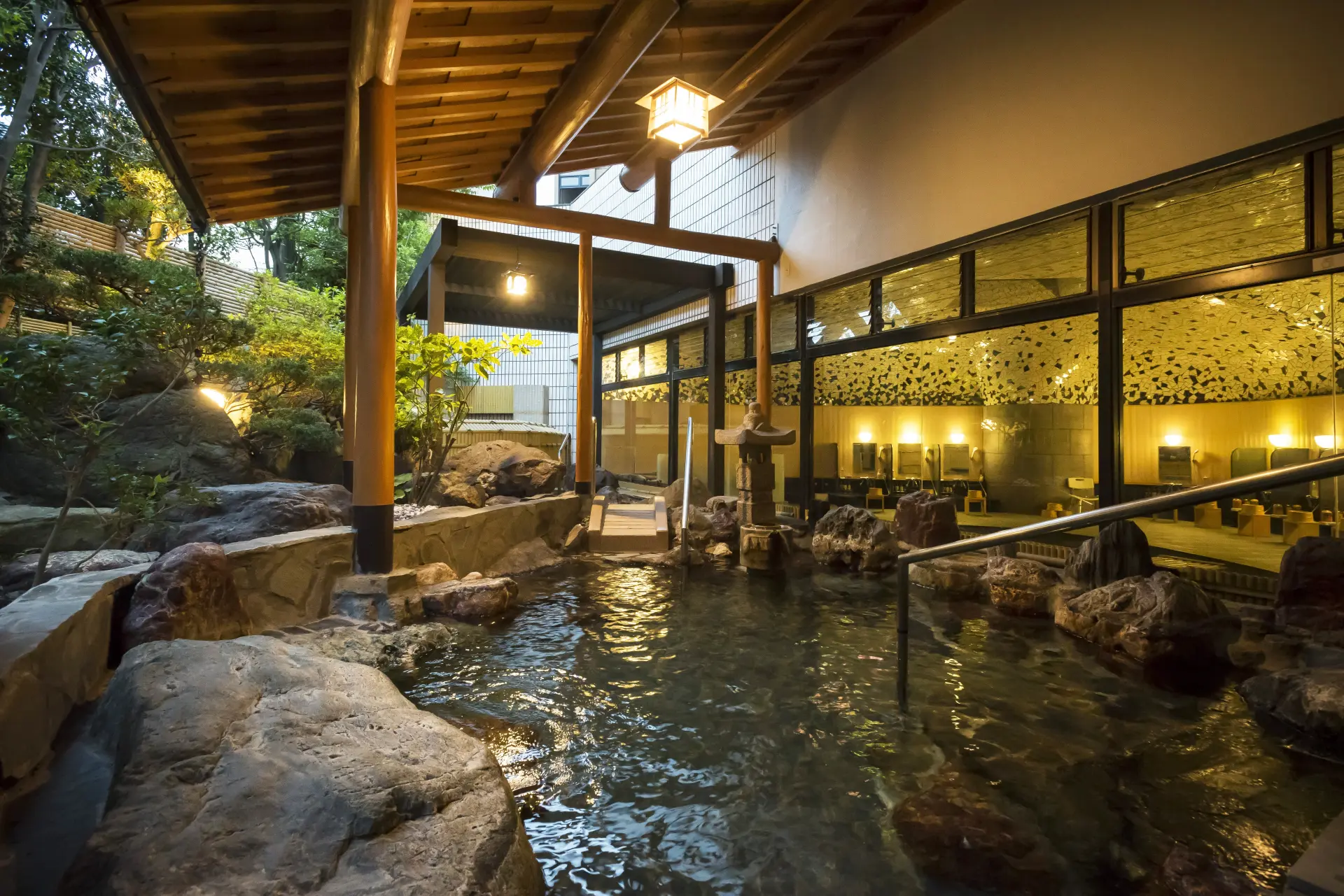 An open-air bath overlooking a beautiful garden