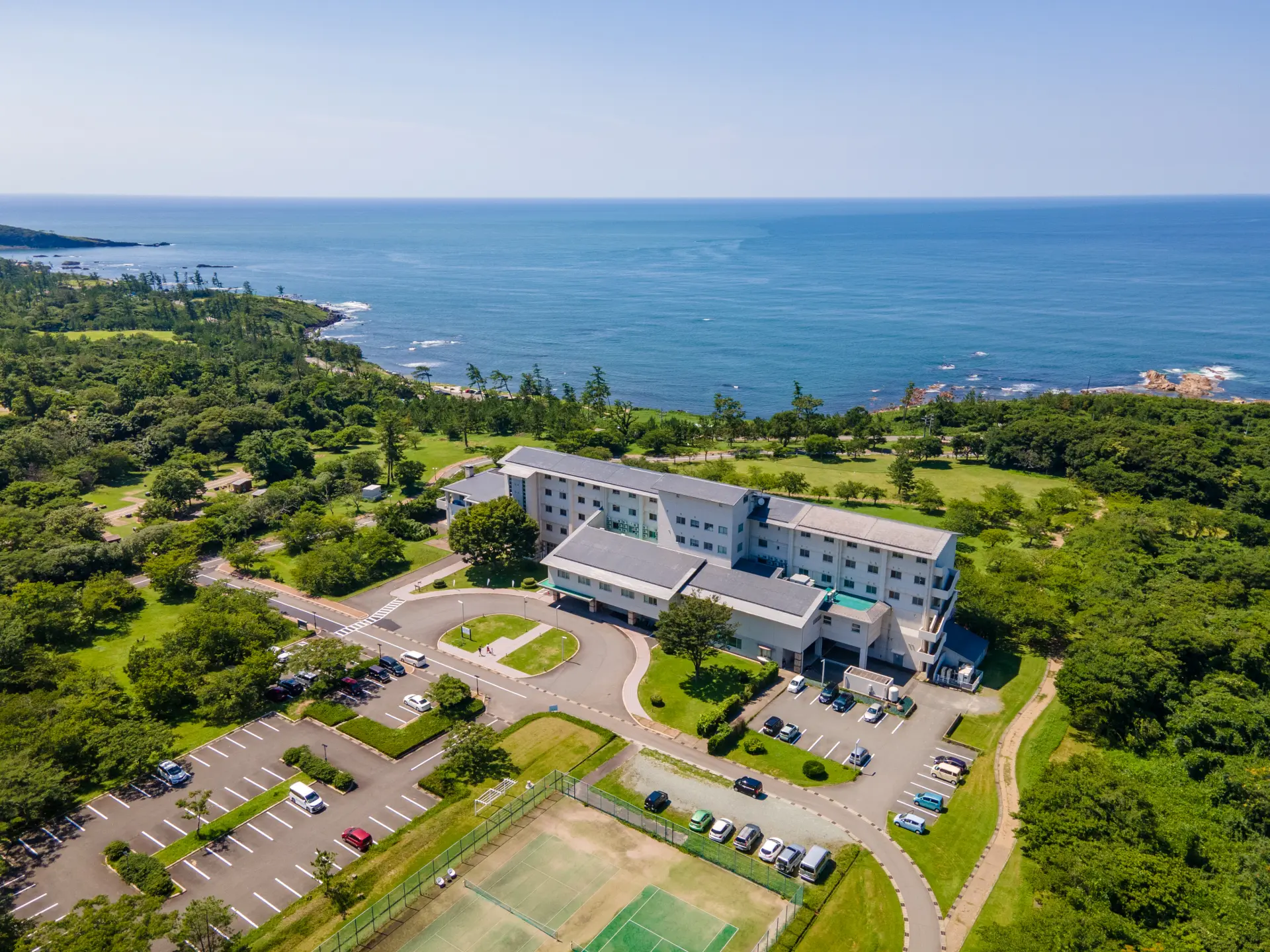 The Sea of Japan stretches beyond the lawn