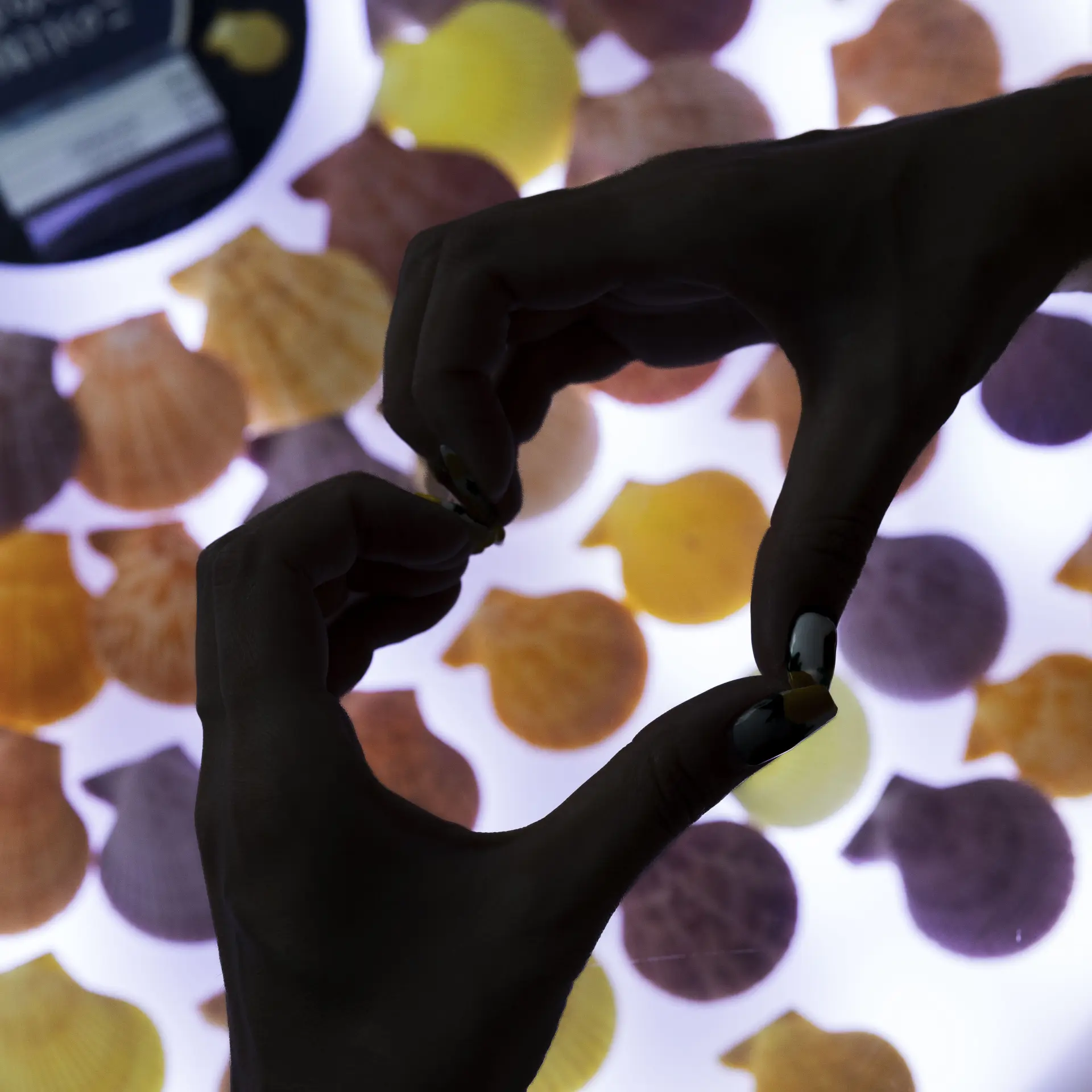 A photo spot with lighting effects, where you can make heart shapes