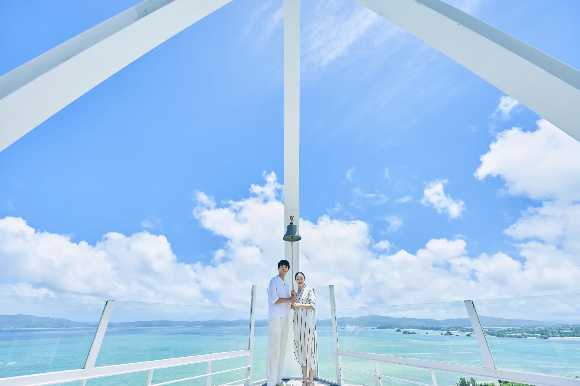 The white Kouri Island Sky & Ocean Chapel against a blue sky
