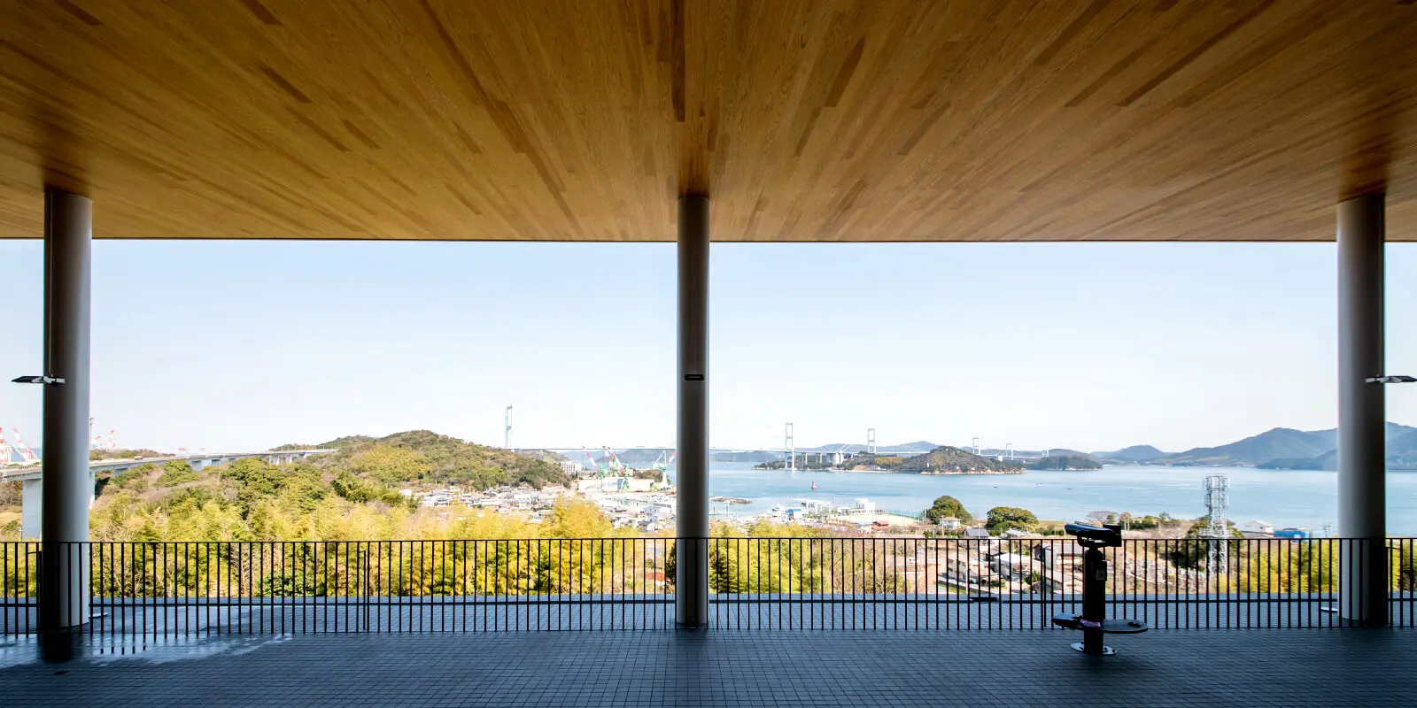 The observation terrace appears to extend toward the sea and offers panoramic views of the Seto Inland Sea’s many islands