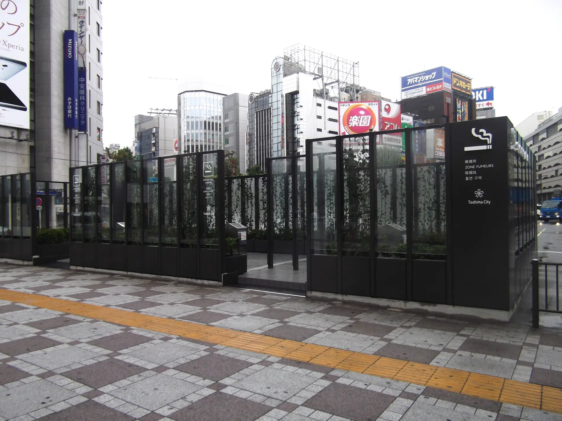 A smoking area on the east side of Ikebukuro Station, open 24 hours