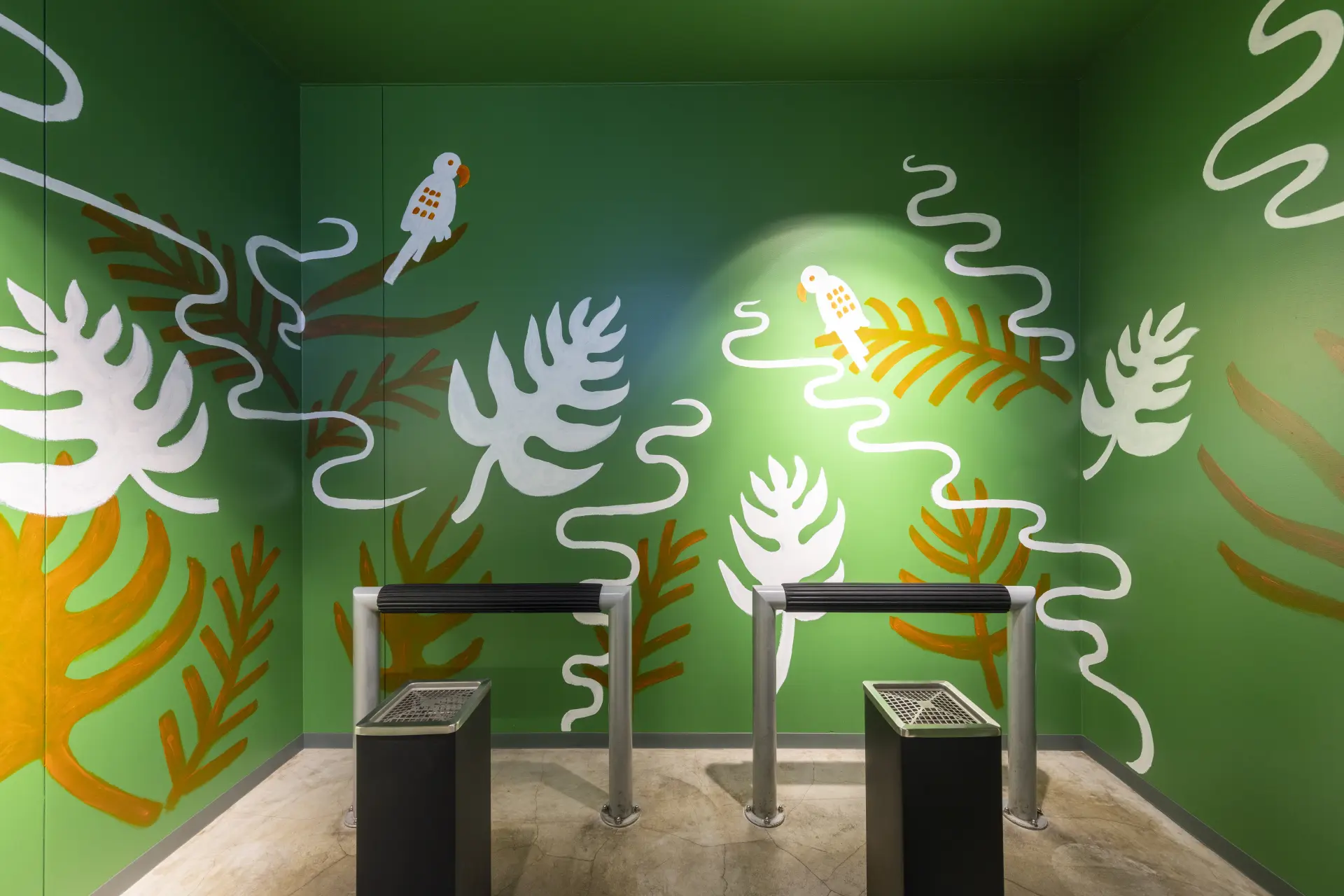 An indoor smoking space with a green color scheme