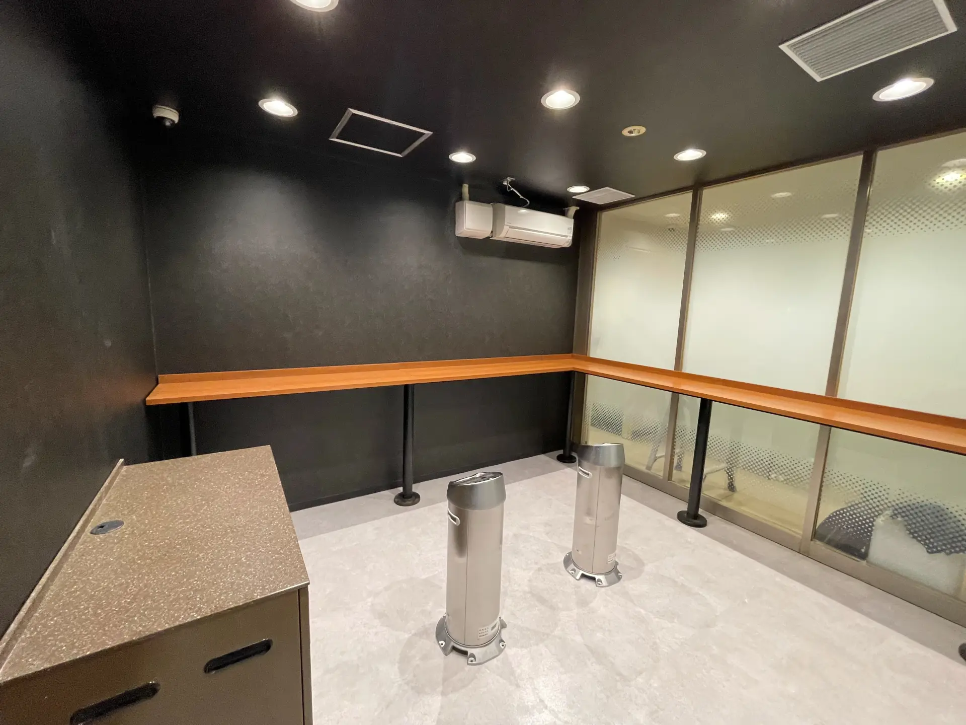 The city-designated smoking area inside the store