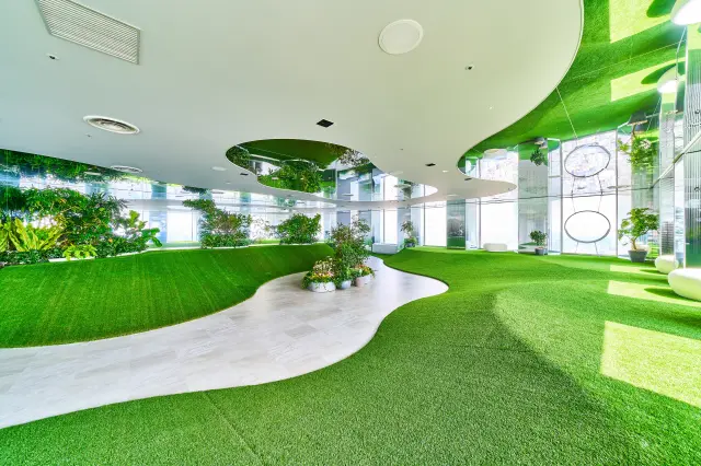 Tenbou no Oka, a grassy hill surrounded by lush artificial turf