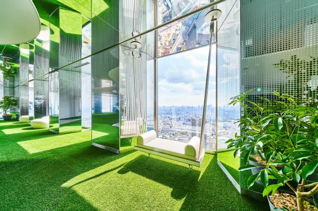 Swing-like benches, cushions, and carefully designed interiors add to the comfort