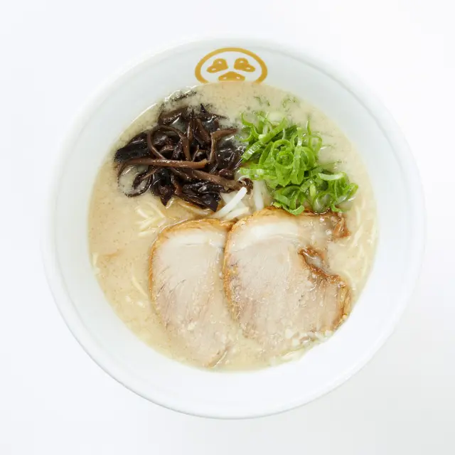 "Tonkotsu (pork bone) ramen," featuring a rich and velvety broth that tantalizes the taste buds.