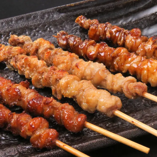 The signature "Torikawa", featuring chicken skin wrapped in layers and grilled to perfection.