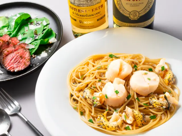 北海道产螺贝与帆立贝的豪华蒜香意大利面（北海道産ツブとホタテの贅沢ガーリックパスタ）