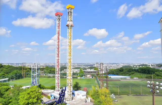 Two thrill rides standing side by side