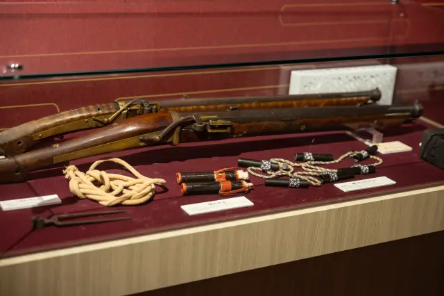 Visitors can view artifacts that bring the history to life, including a matchlock gun.